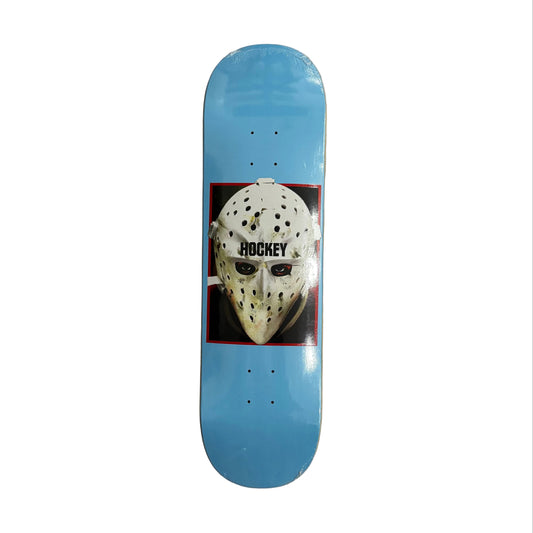 Skateboard deck with hockey mask design on a white surface