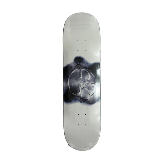Skateboard deck with a black and white design on a white surface