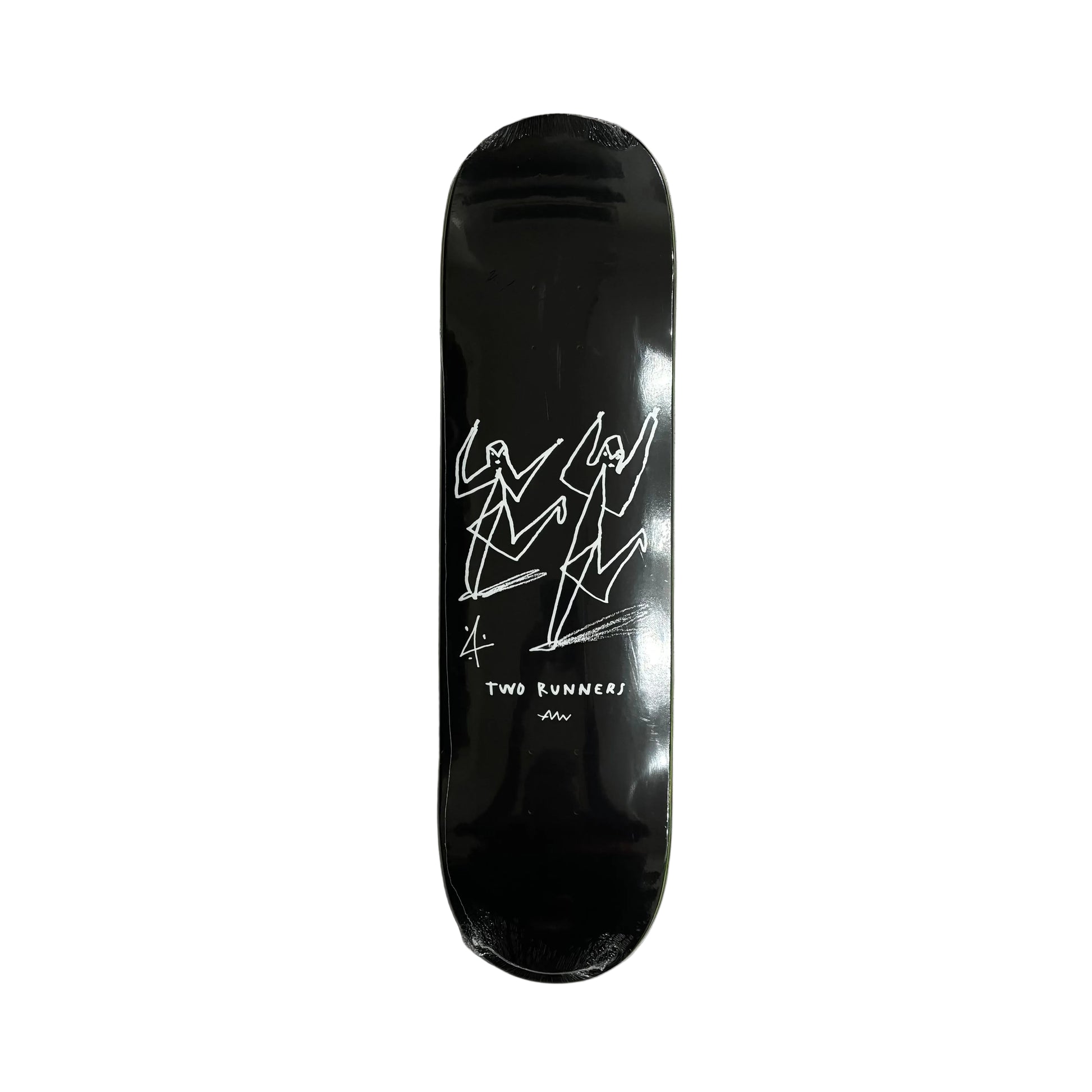 Black skateboard deck with white graphics on a white surface