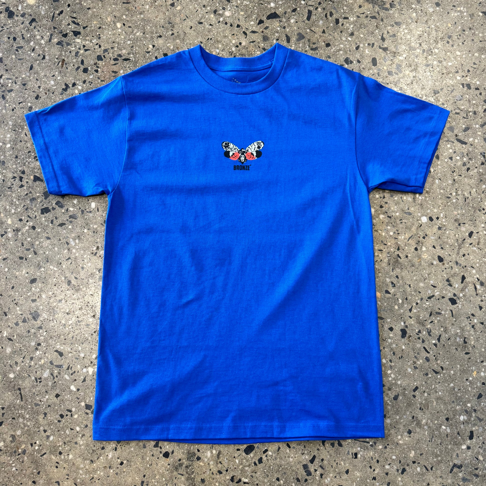 multi color butterfly on royal blue T-shirt