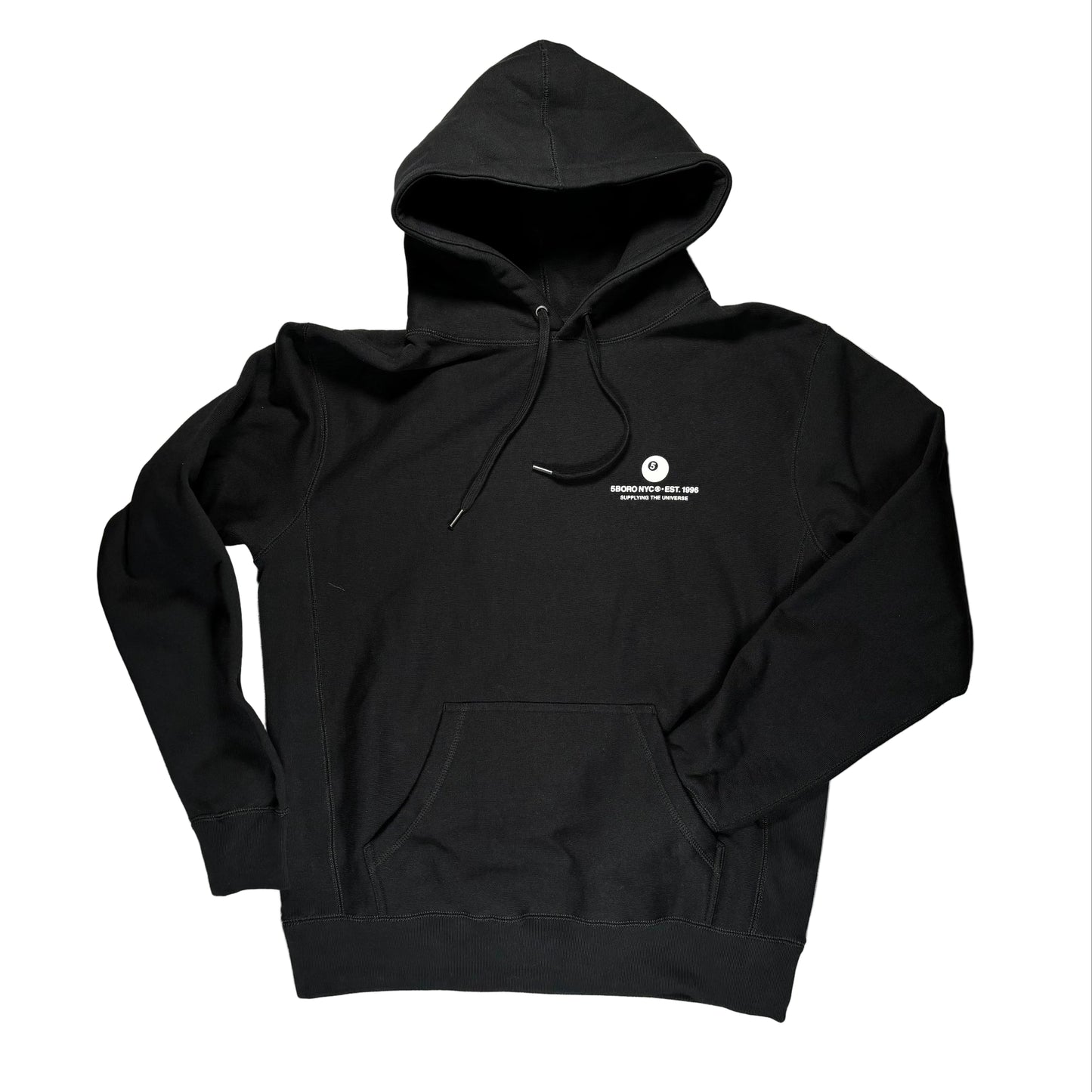 Black hoodie with a small white logo on a white surface