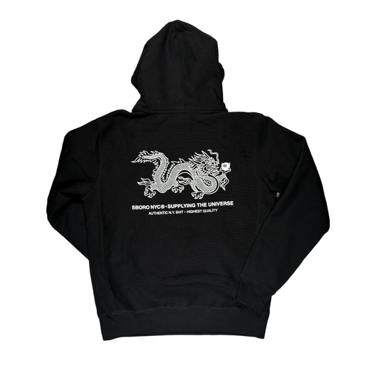 Black hoodie with white dragon design on a white surface