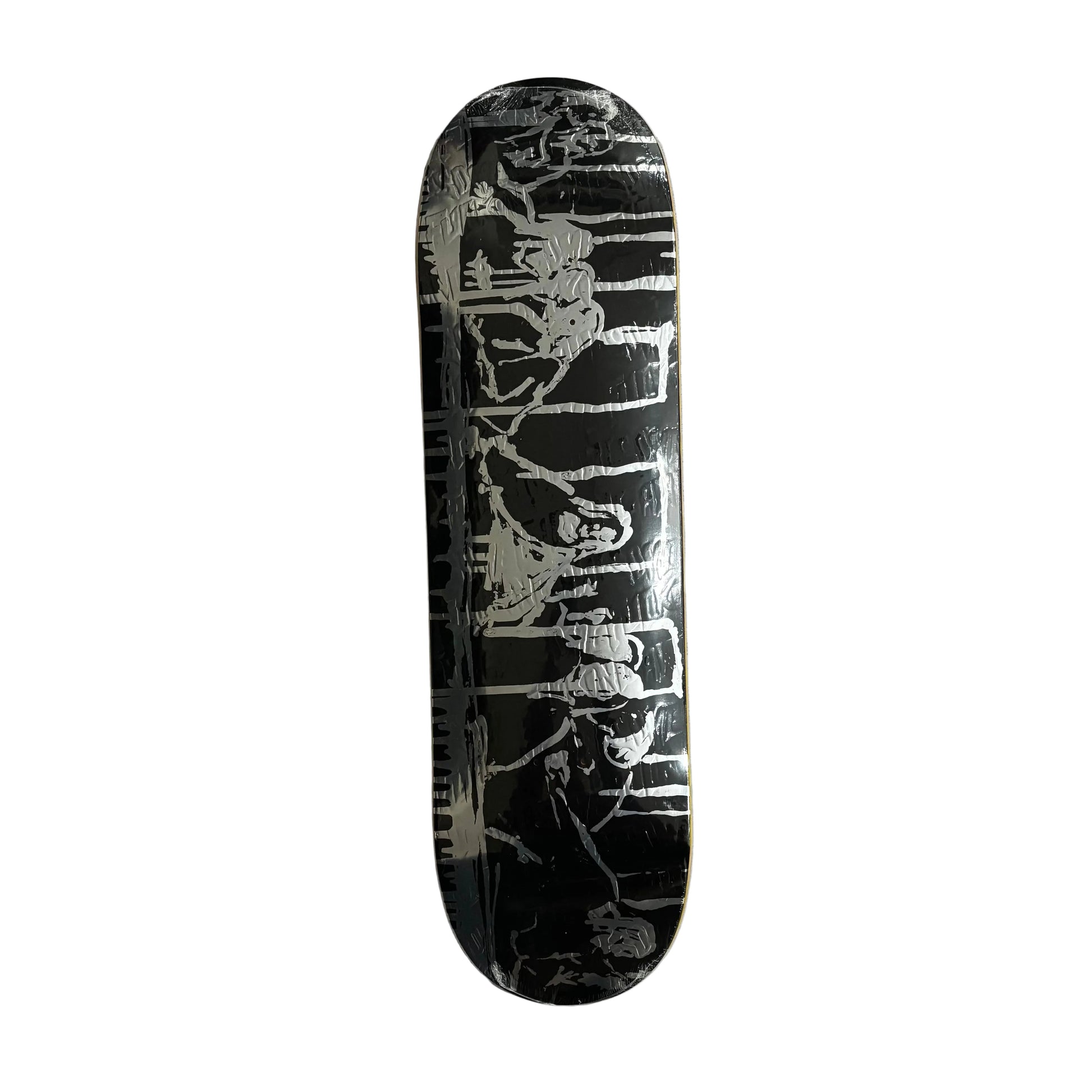 Black skateboard deck with silver graffiti style abstract design on a white background