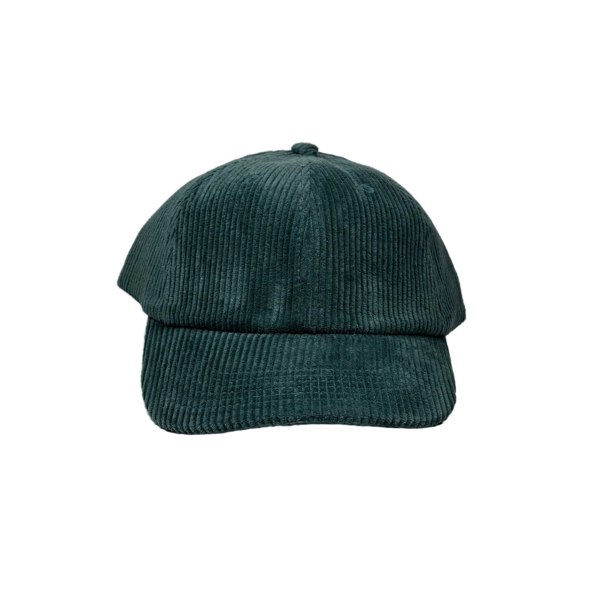 Green corduroy cap on a white background
