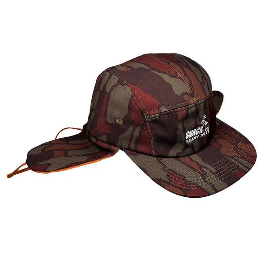 Camouflage-patterned earflap  cap, with ear flaps laying open, on a white background