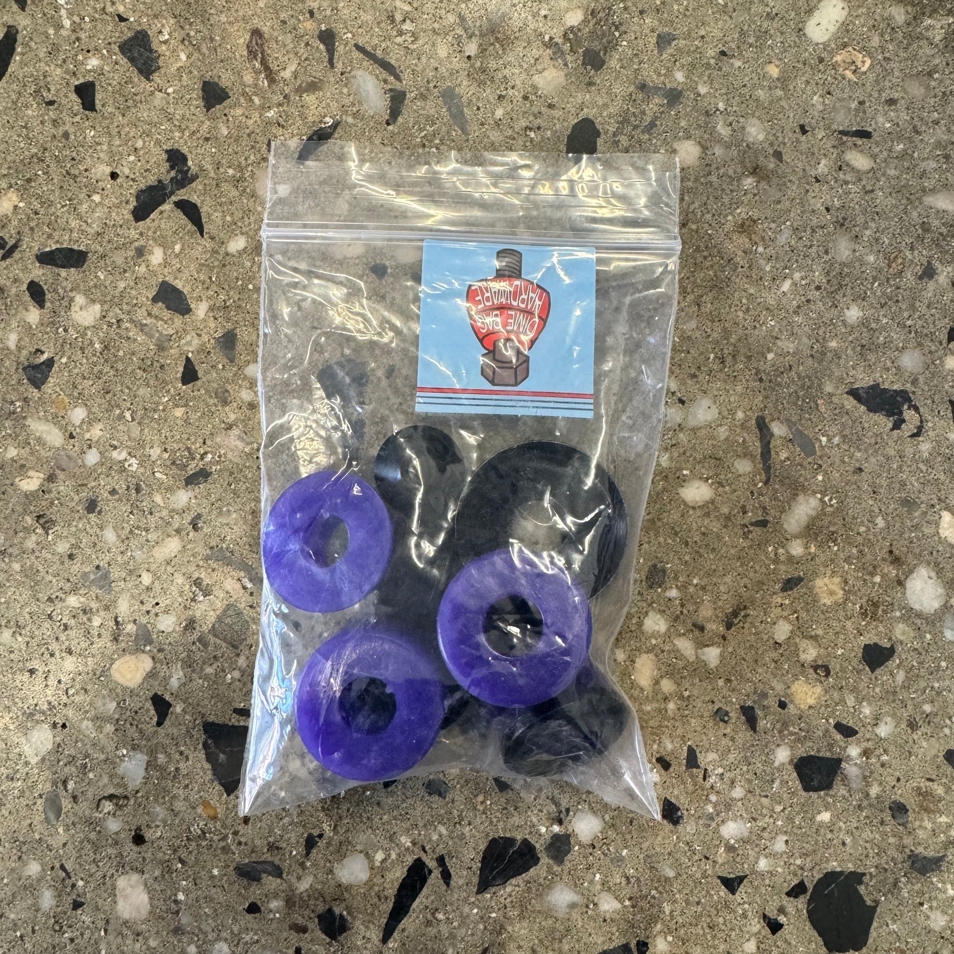 Purple bushings, black washers in small plastic bag