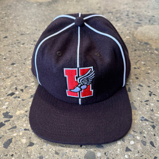 Red H with Winged foot on black six panel hat