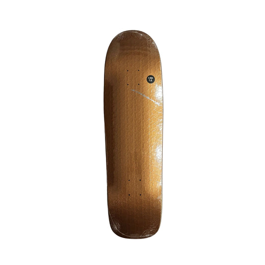 brown metallic shaped skateboard deck on a white surface