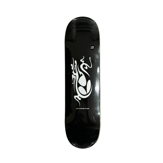 Black skateboard deck with white logo on a white surface