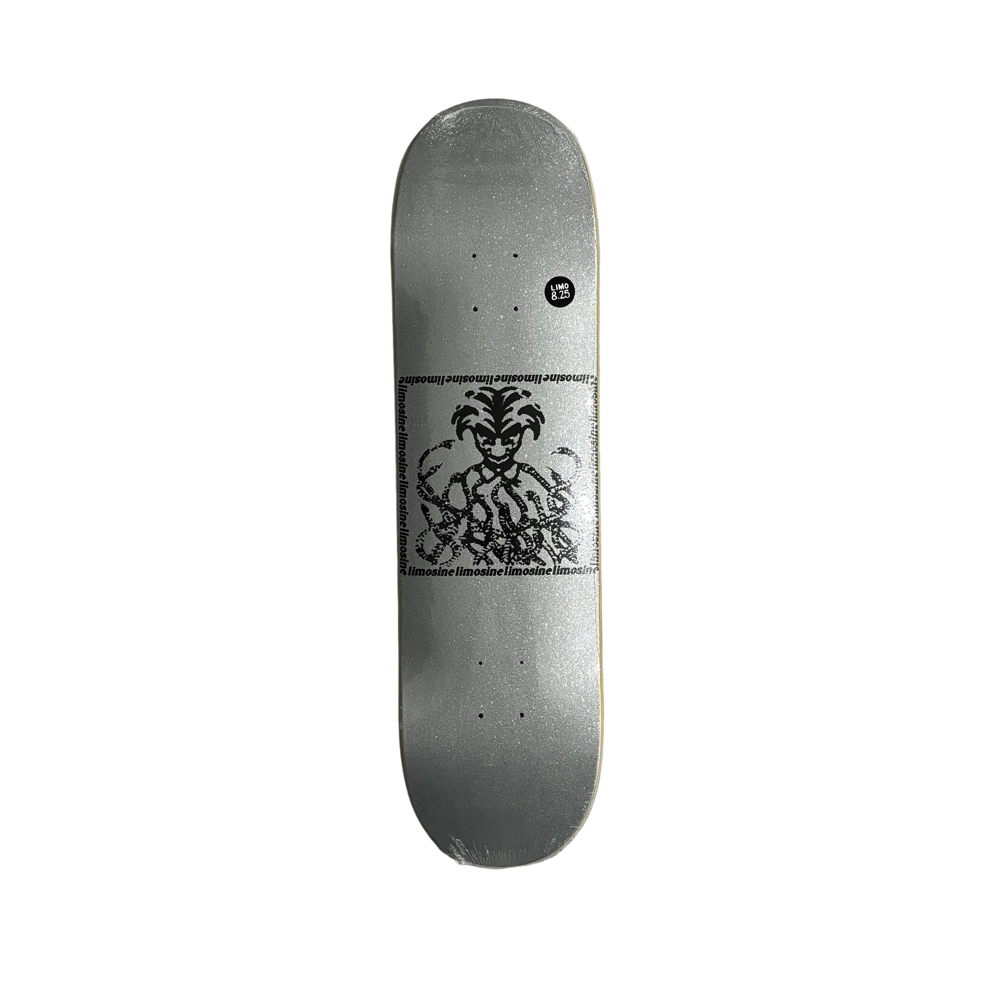silver glitter Skateboard deck with a black graphic design on white surface