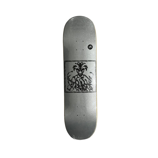 silver glitter Skateboard deck with a black graphic design on white surface