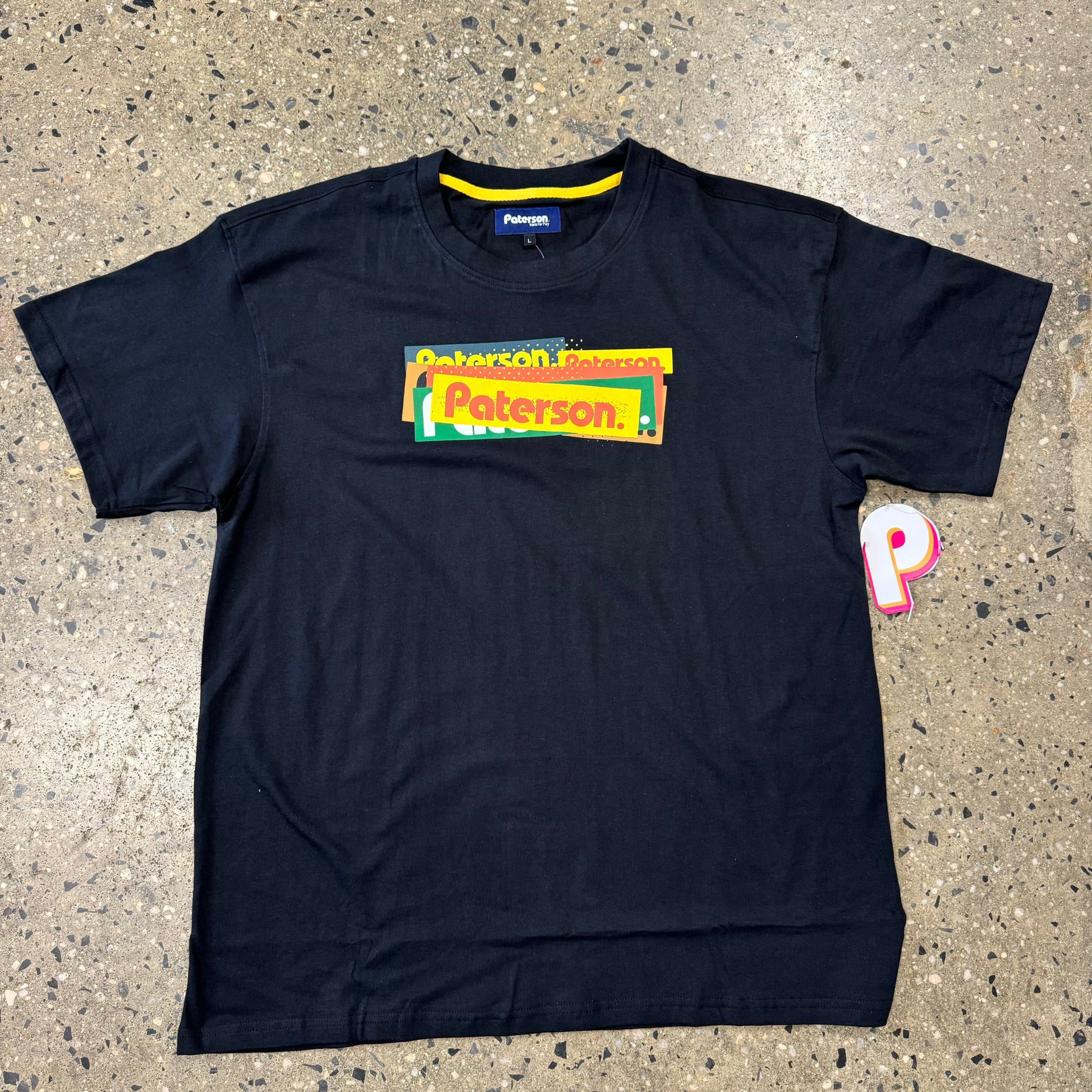 multi color logo on black T-shirt