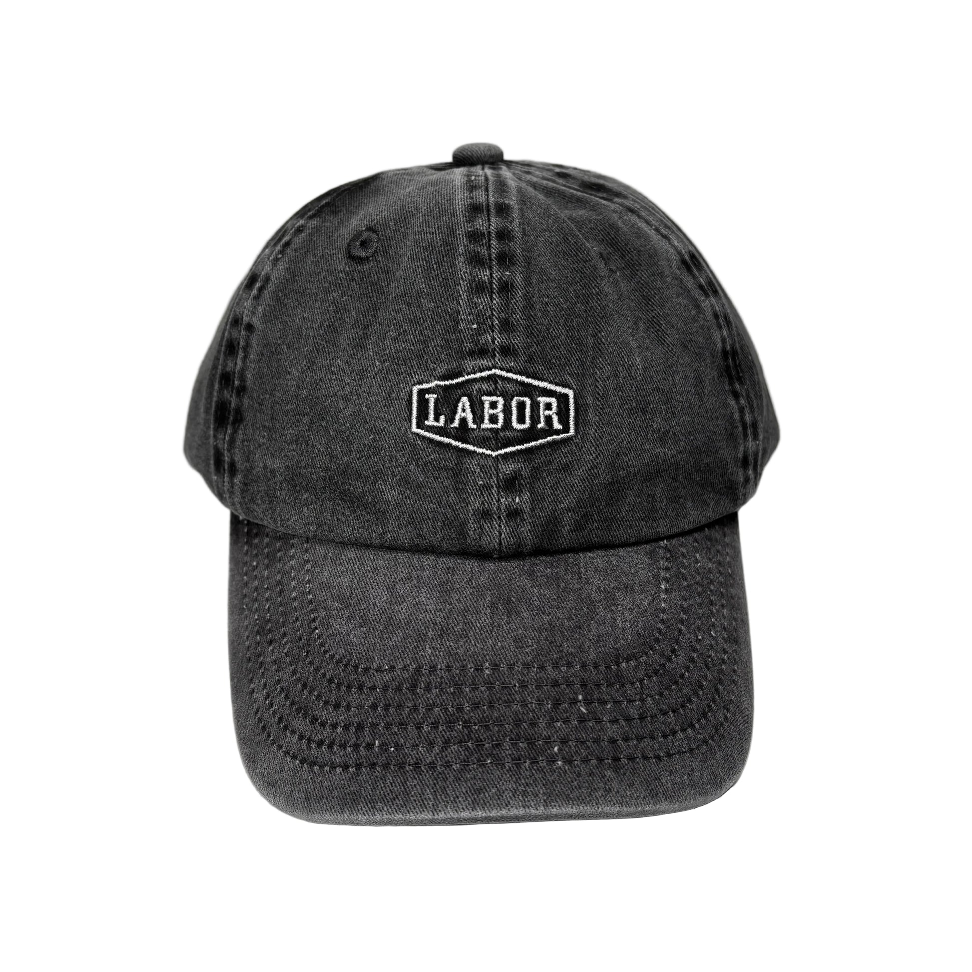 front view of black washed and distressed crest logo cap