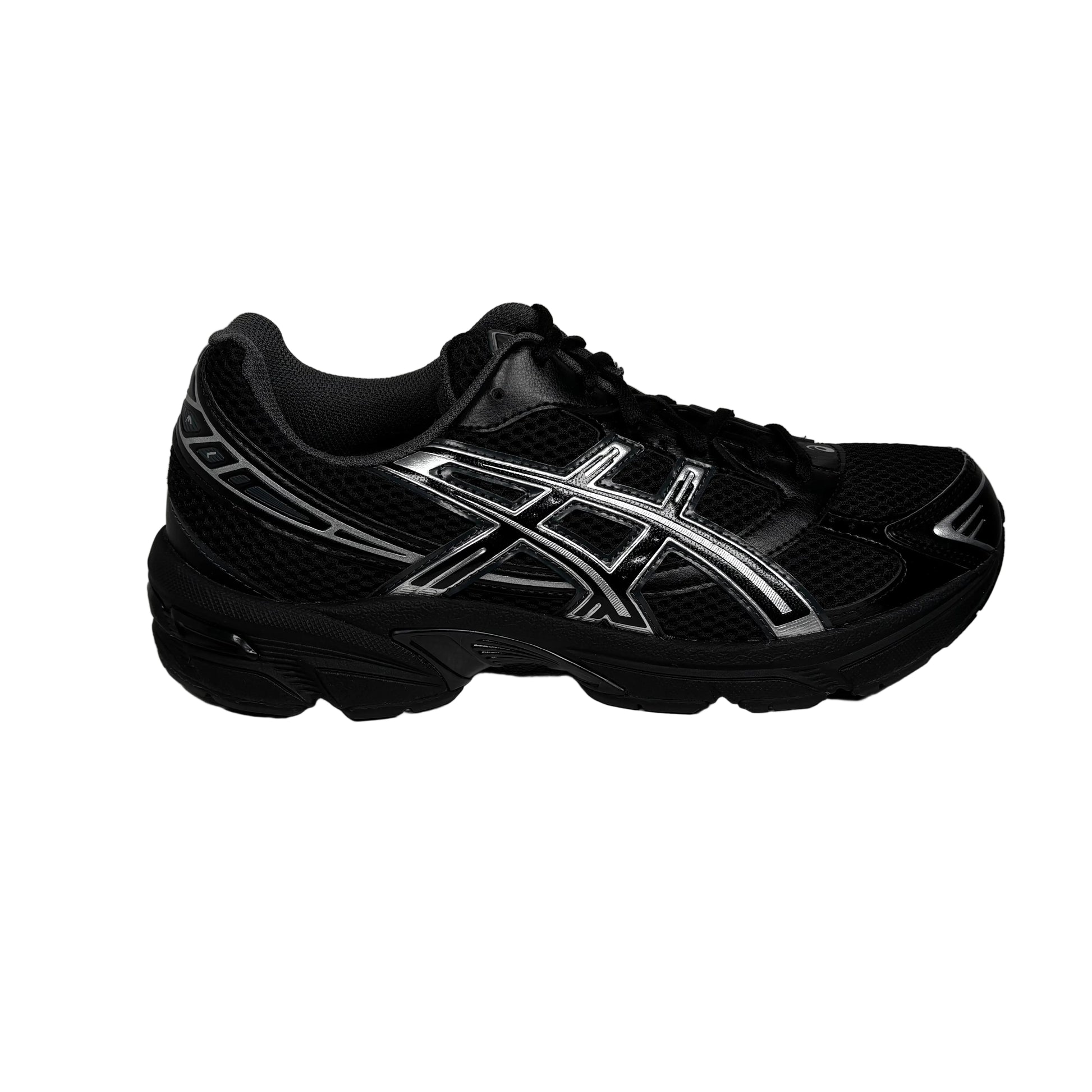 Black athletic shoe with white logo on a gray background