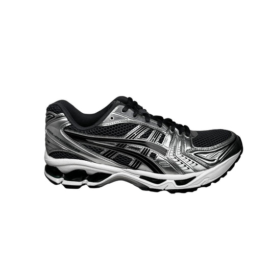 Black and silver running shoe on a white  background