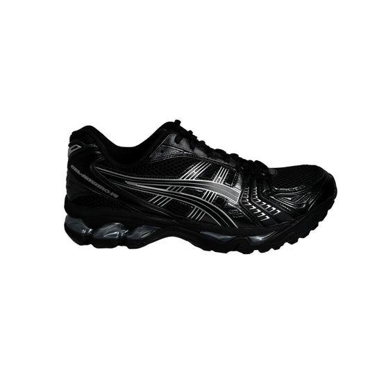 Black athletic shoe on a white background