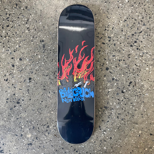 red flame, grey buildings, and blue logo on black skate deck