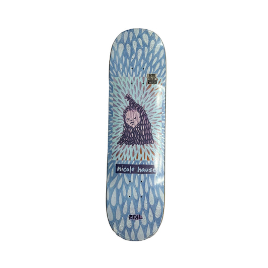 Skateboard deck with a hand drawn design of a face and text on a white surface