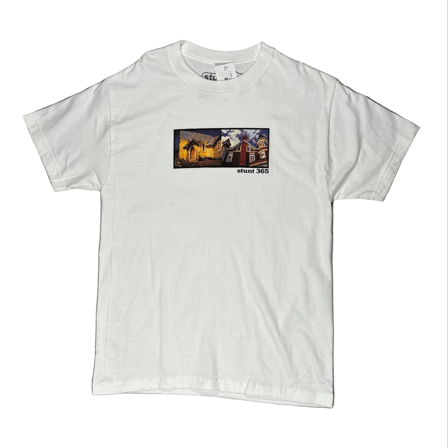 White t-shirt with a graphic design on a gray surface