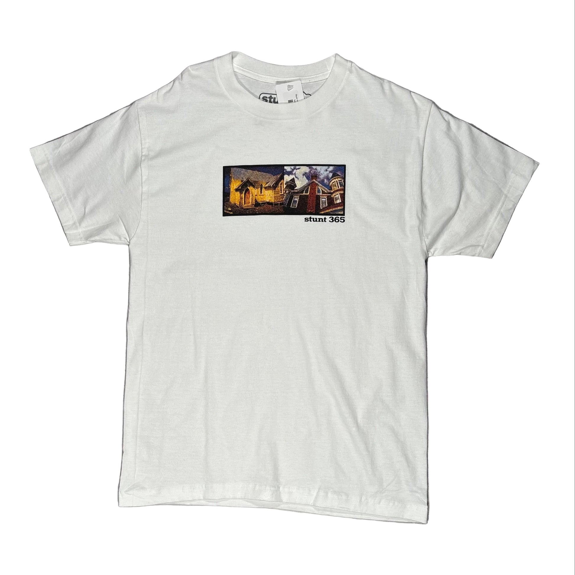 White t-shirt with a graphic design on a gray surface