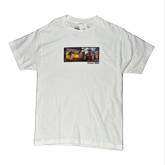 White t-shirt with a graphic design on a gray surface