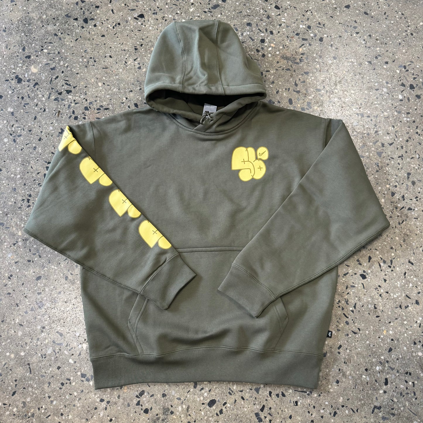 olive hoodie with yellow logo