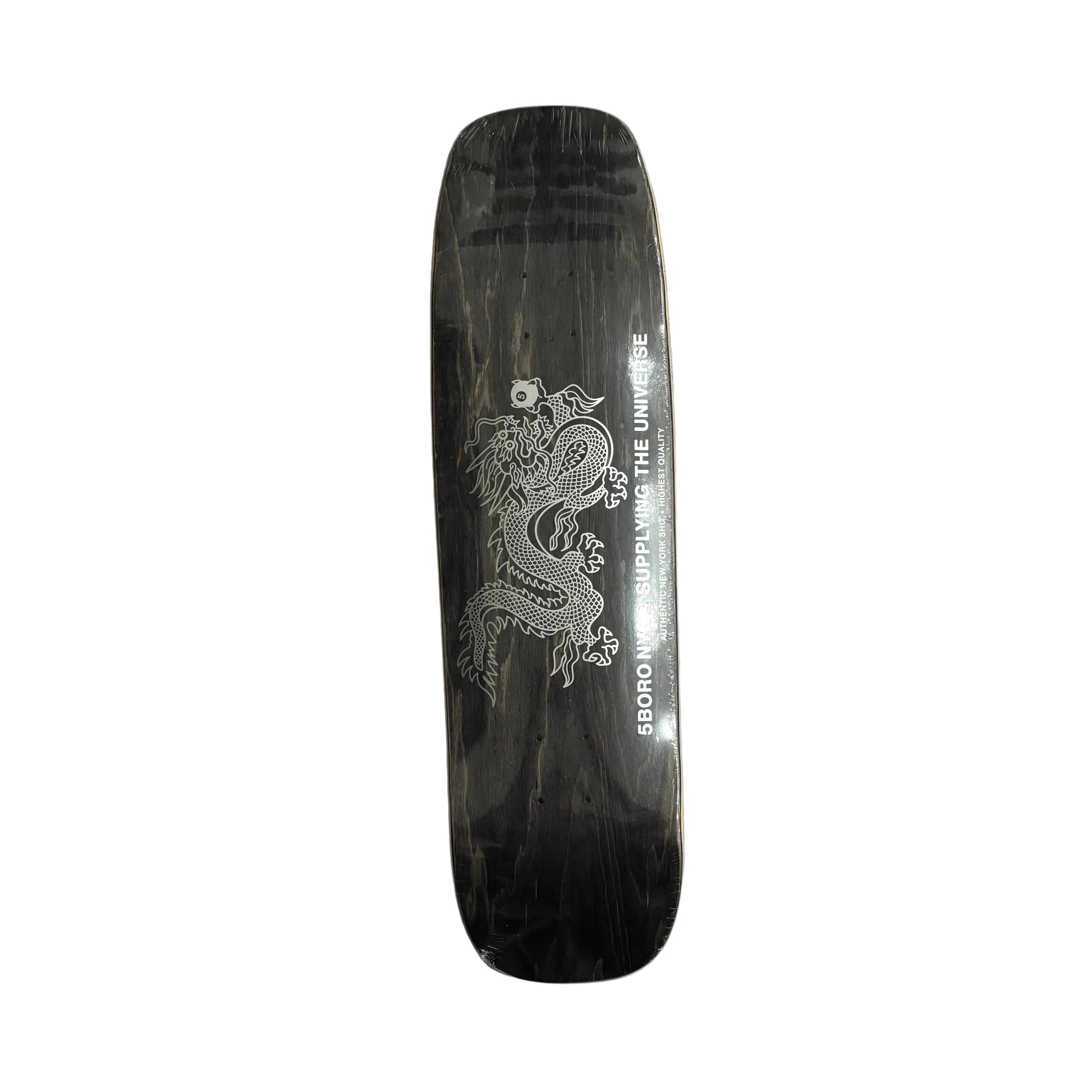 Black square shaped skateboard deck with a white dragon design on a white background