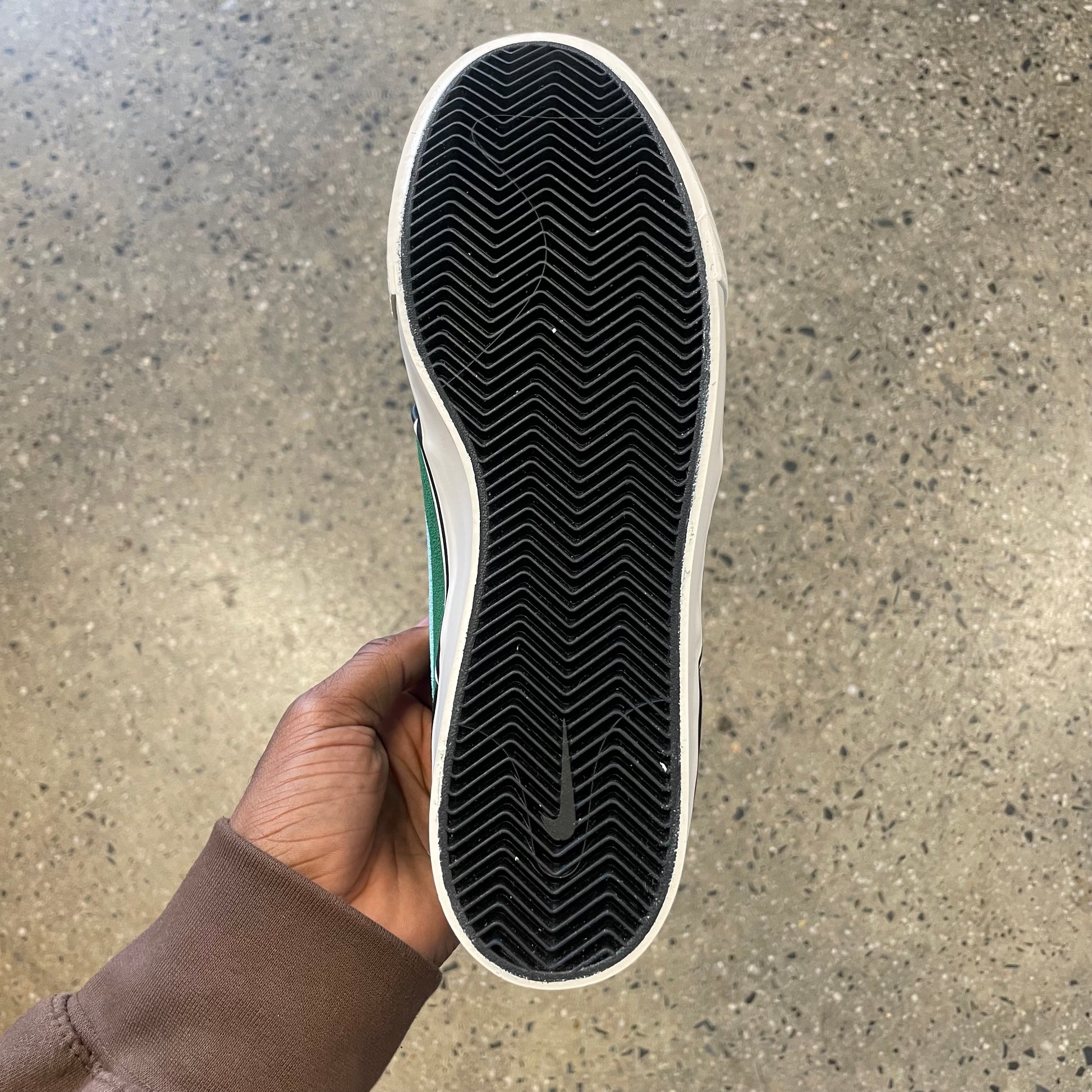 view of black gum bottom of shoe