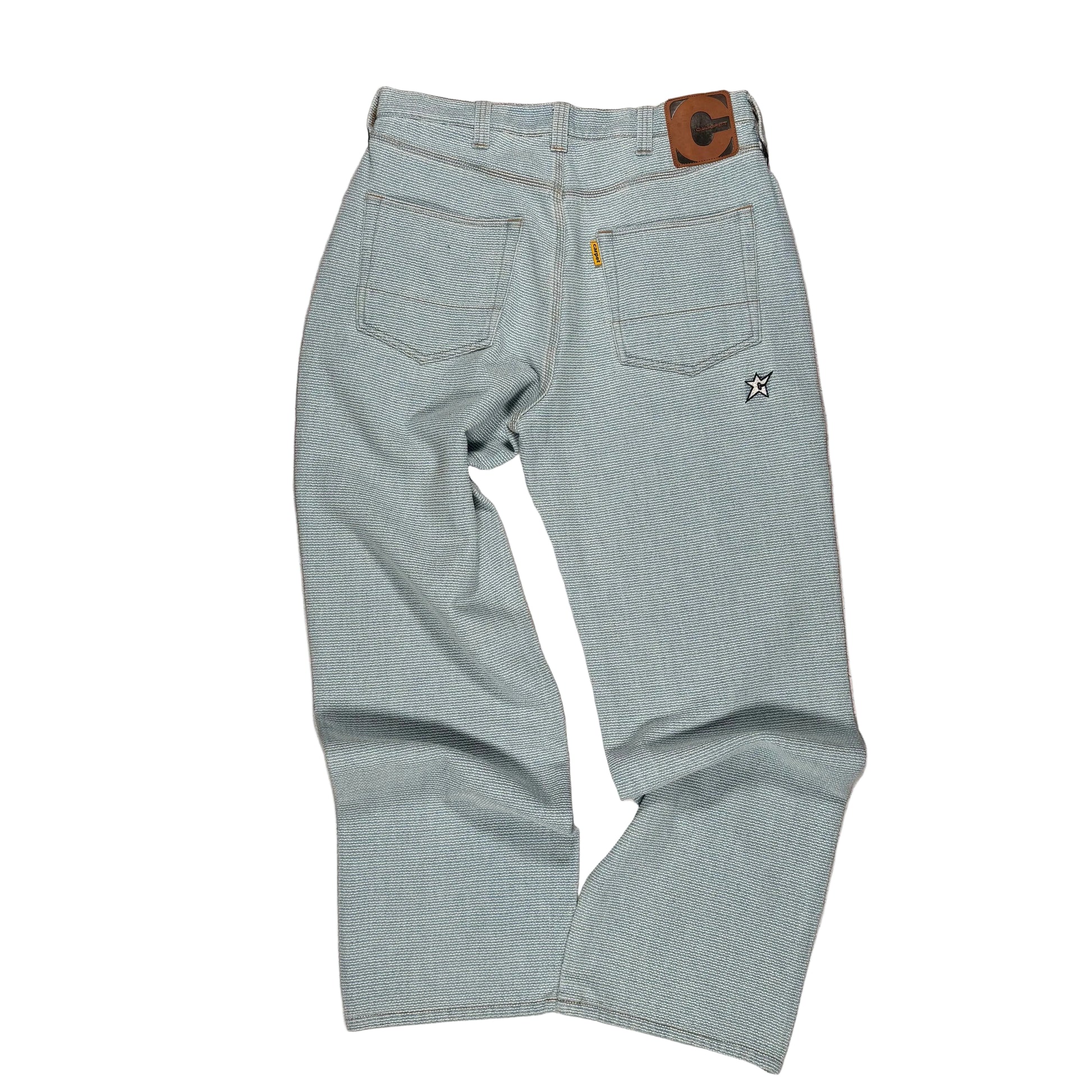 rear of Light blue jeans on white background