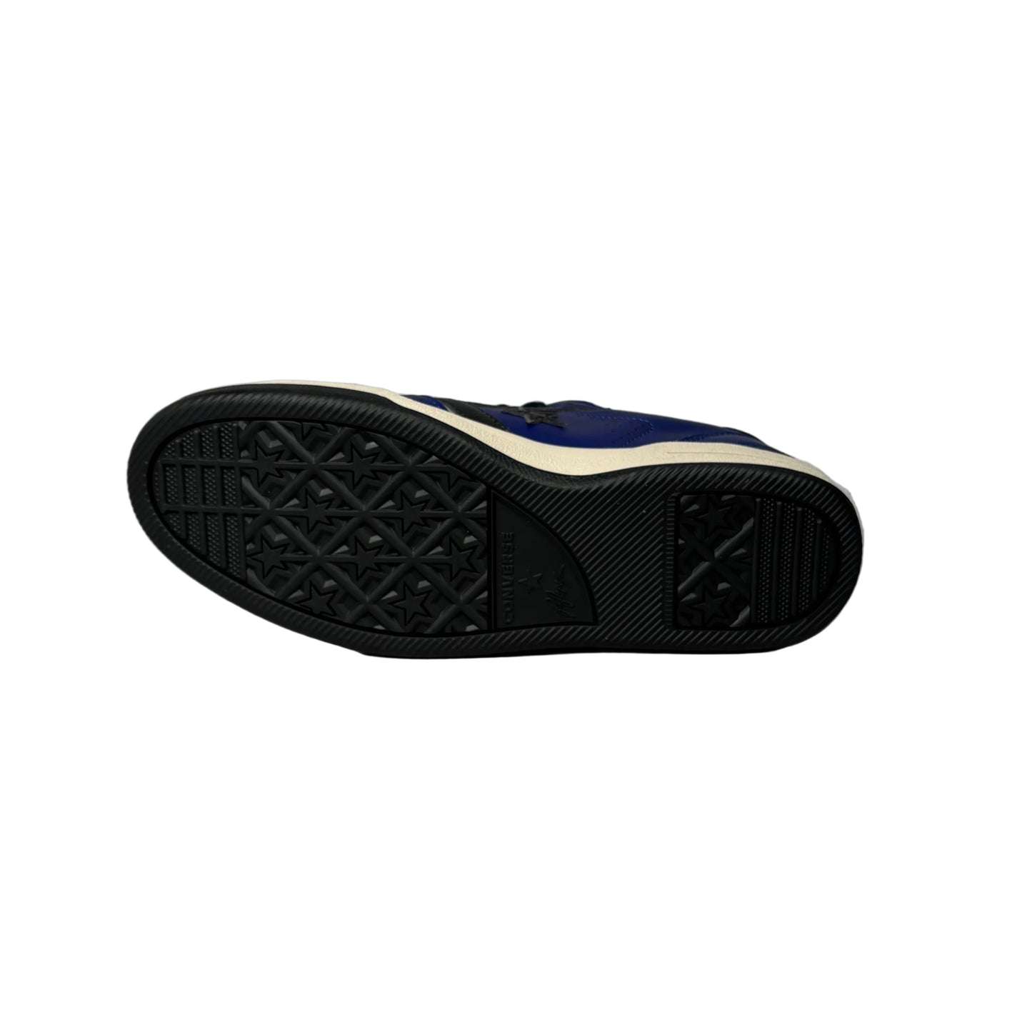 Navy blue sneaker sole with white out sole on a white background
