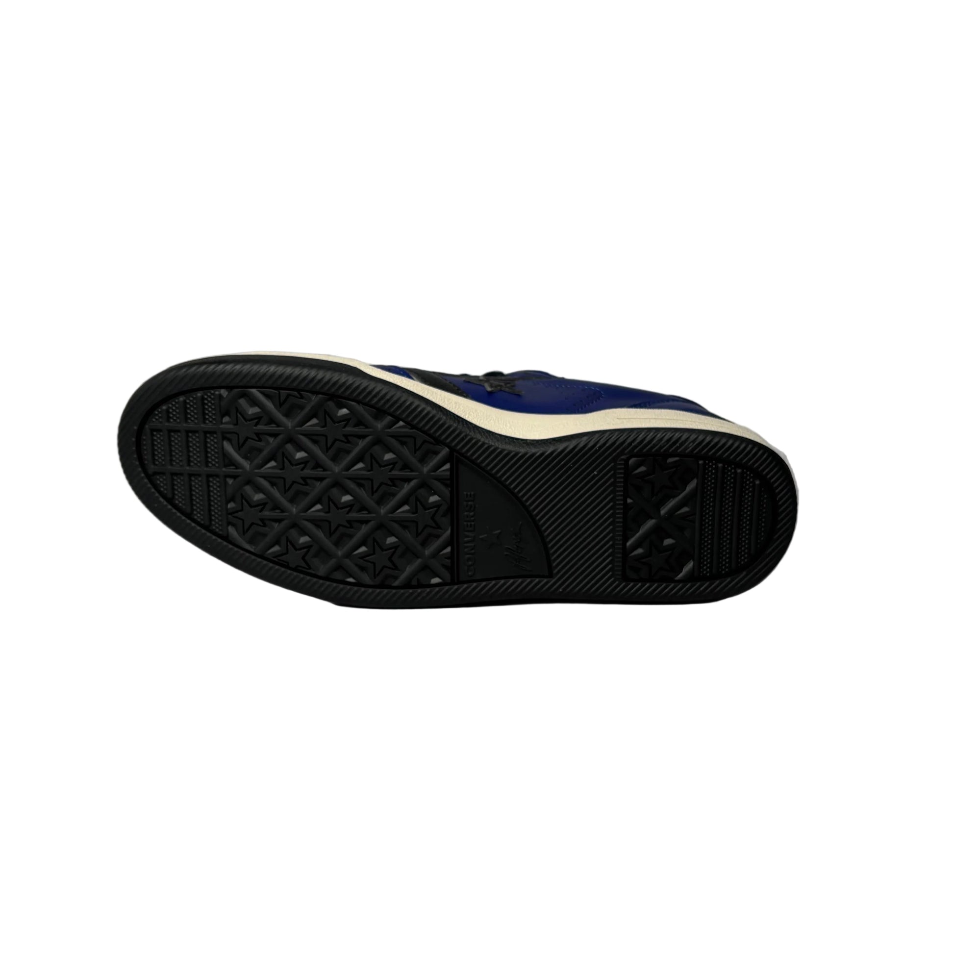 Navy blue sneaker sole with white out sole on a white background