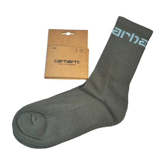 Gray sock with 'Carhartt' branding next to a brown packaging box on a white background