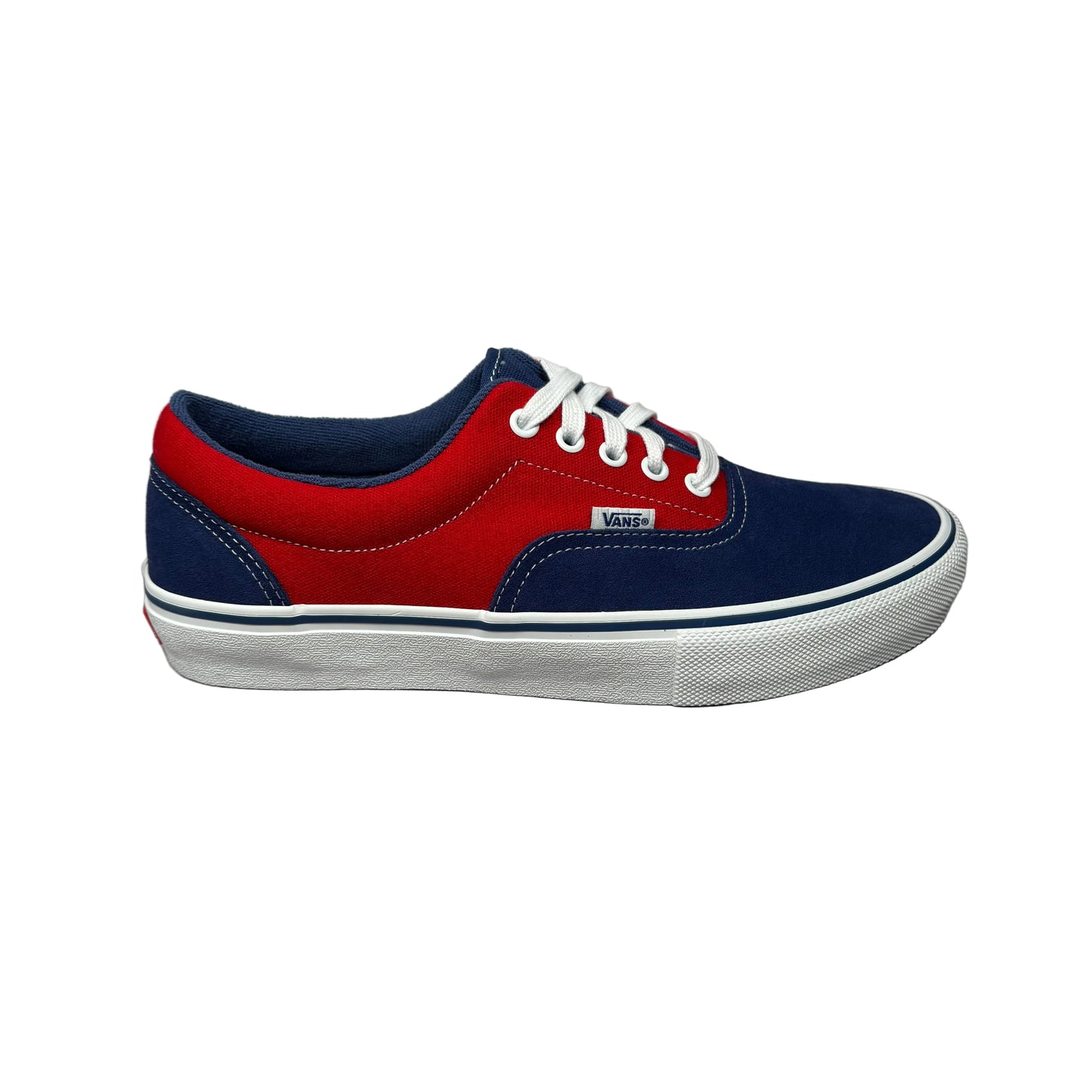 Blue and red sneaker with white laces on a white background