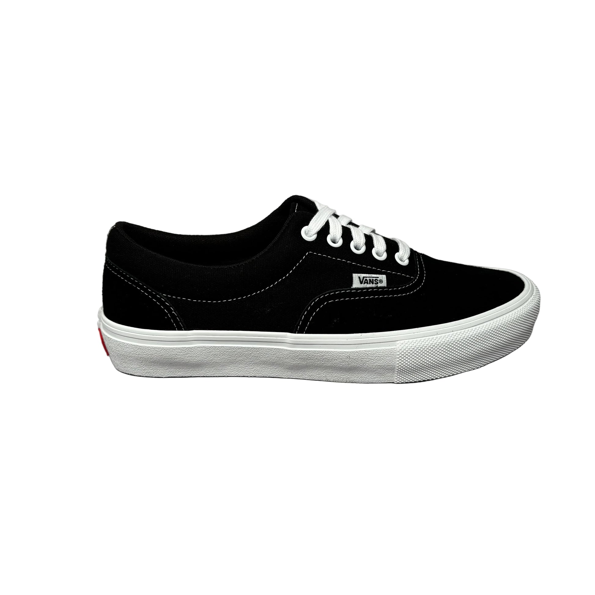 Black sneaker with white laces on a white background
