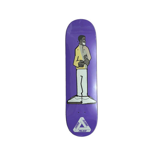 Purple skateboard deck with a graphic design on a white surface