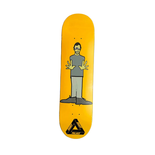 Yellow skateboard deck with a graphic design on a white surface