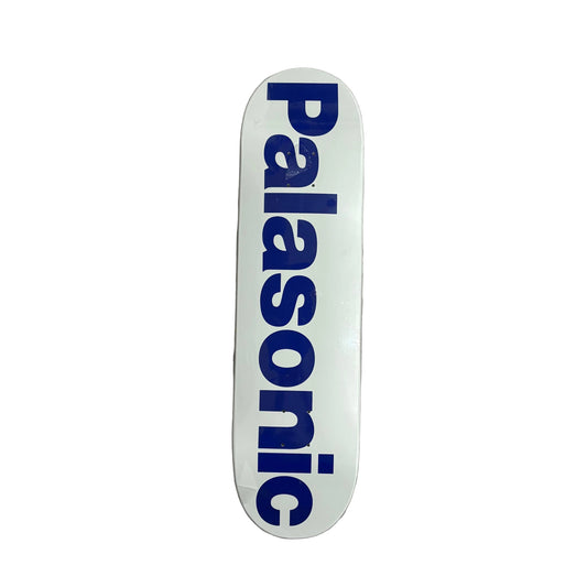 Skateboard deck with 'Palasonic' logo on a white surface