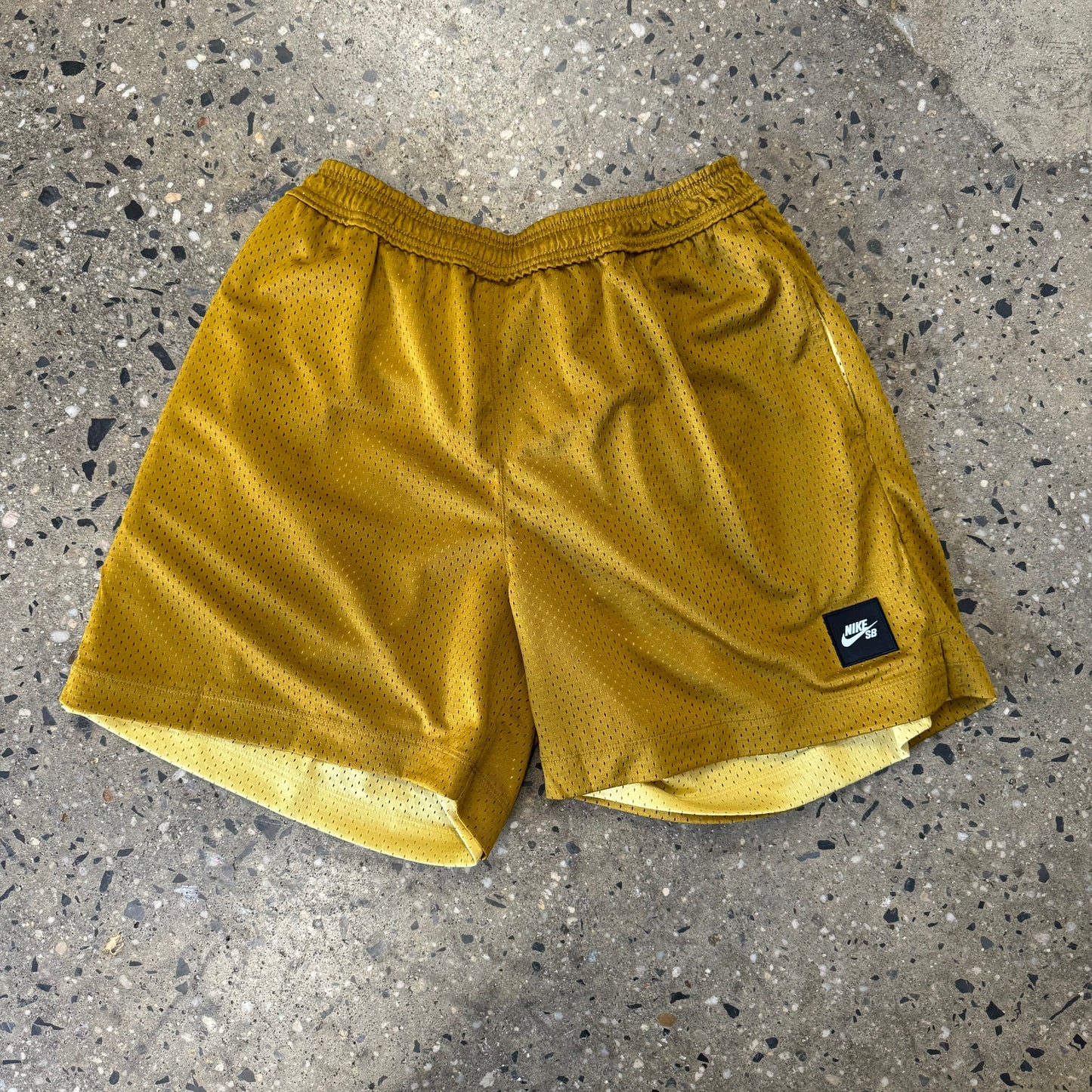 gold reversible mesh shorts