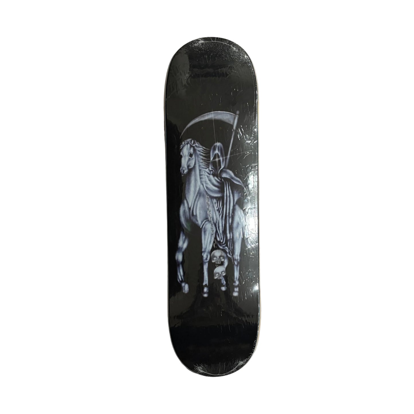 Skateboard deck with a black and white graphic of a horse and rider on a white surface.