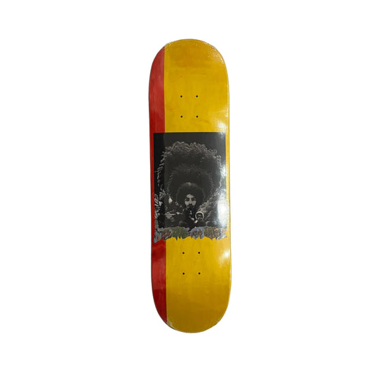 Skateboard deck with a graphic design on a white surface