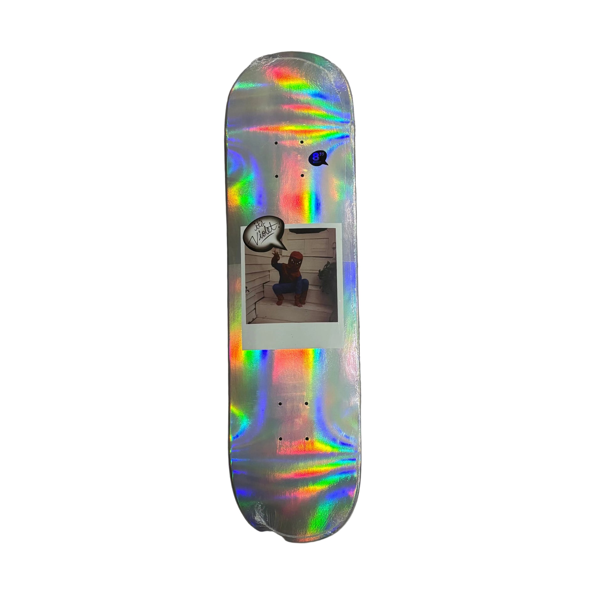 Skateboard deck with a colorful, iridescent design on a white surface.