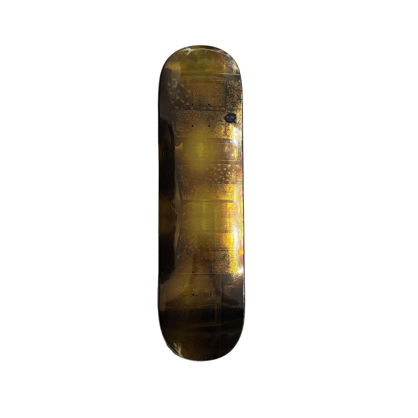 Skateboard deck with a reflective gold surface on a white background