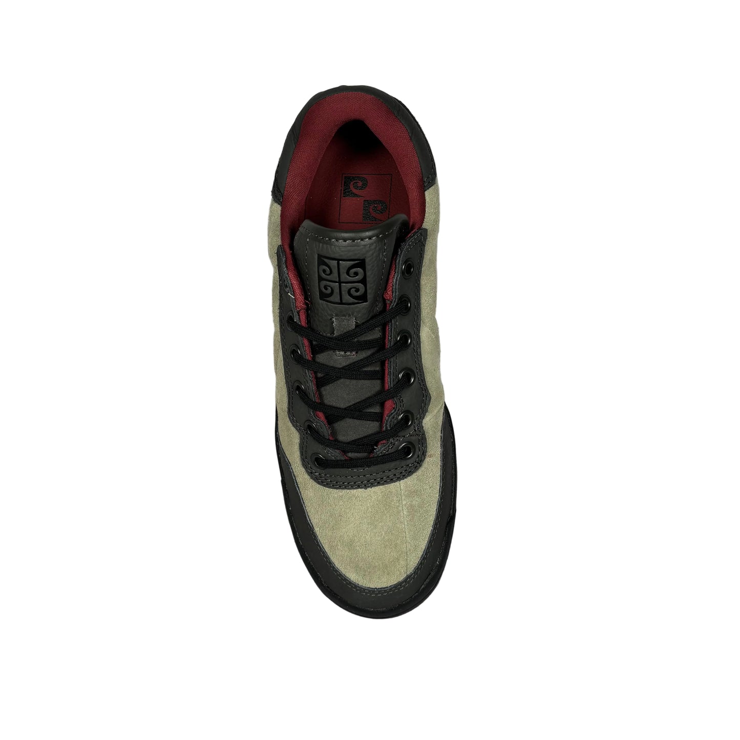 Sneaker with a gray and red design on a gray textured background