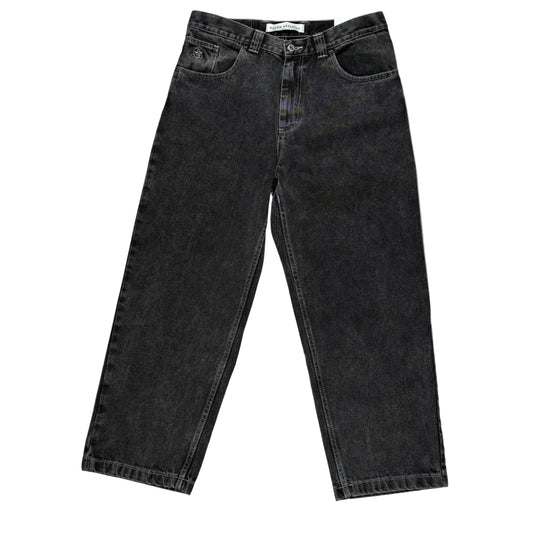 Black jeans laid flat on a white surface