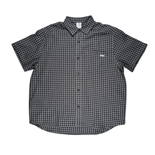Black and white checkered shirt on a white surface