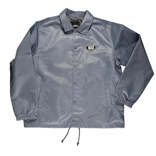 Gray nylon jacket with a brand logo on a gray surface