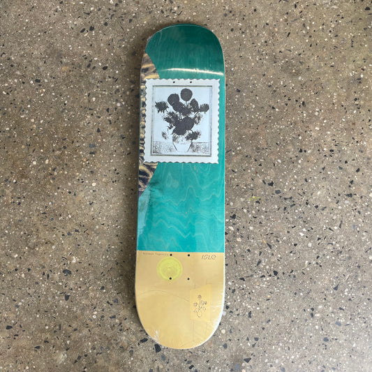 black and white flower stamp on green and yellow wood grain skate deck (wood grain colors may vary)