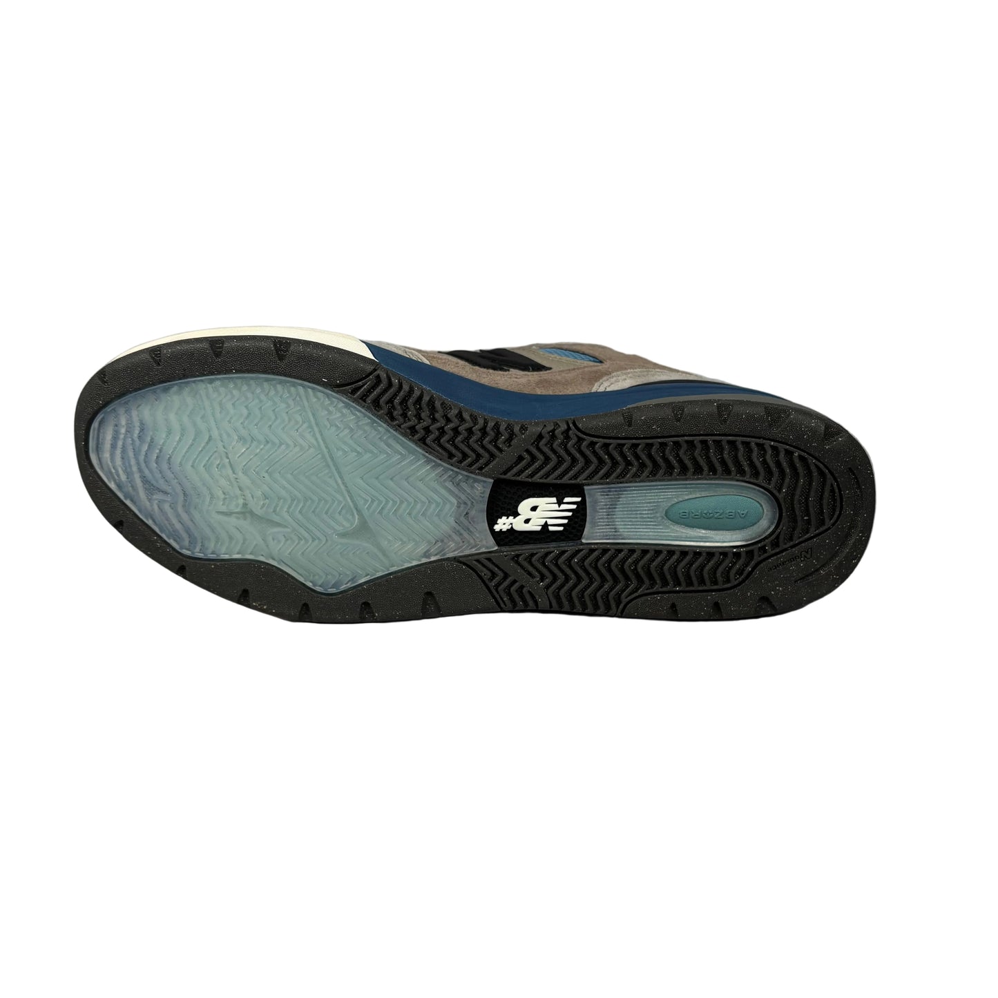 Sole of a sneaker with New Balance logo on a white background