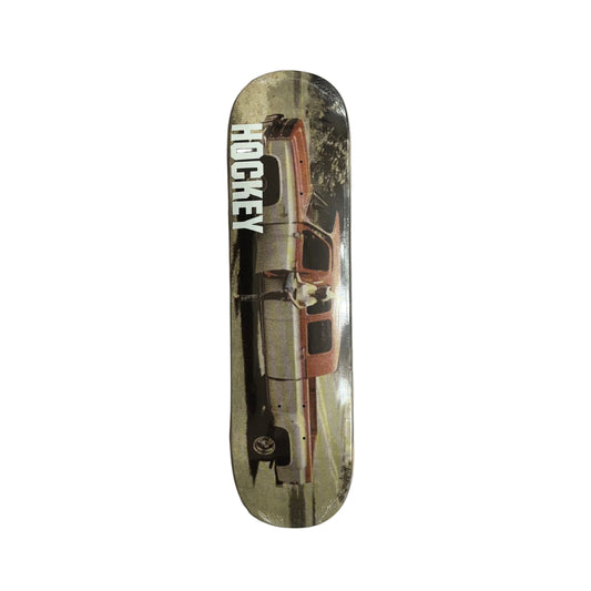 Skateboard deck with vintage car design and 'Hockey' branding on a white surface