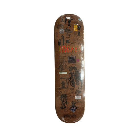 Skateboard deck with graphic of printed various stickers on a white background